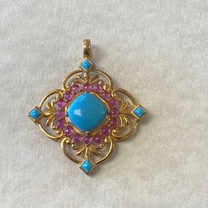 Beautiful sleeping beauty turquoise and ruby sterling silver gold tone pendant